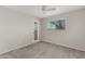 Bedroom showcasing neutral colored walls, a ceiling fan, carpet, and windows at 638 W 16Th St, Tempe, AZ 85281