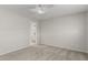 Bright bedroom features neutral walls, carpet, and a ceiling fan at 638 W 16Th St, Tempe, AZ 85281