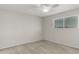 Neutral bedroom with carpet, a ceiling fan, and a window at 638 W 16Th St, Tempe, AZ 85281