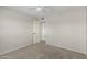 View of a bedroom showcasing neutral colored walls, a ceiling fan, and fresh carpet at 638 W 16Th St, Tempe, AZ 85281