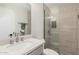 Modern bathroom featuring a glass enclosed shower, and grey vanity with a sink at 6926 E Moreland St, Scottsdale, AZ 85257