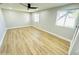 Spacious bedroom with light wood floors, neutral wall paint, and lots of natural light from the windows at 6926 E Moreland St, Scottsdale, AZ 85257