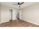 Bedroom featuring a ceiling fan, and closet and en suite entrances at 6926 E Moreland St, Scottsdale, AZ 85257