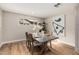 Cozy dining room features modern decor, wood flooring and ample natural light at 6926 E Moreland St, Scottsdale, AZ 85257