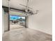 Spacious garage with an open door, offering ample parking and storage space at 6926 E Moreland St, Scottsdale, AZ 85257