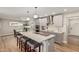 Spacious kitchen features stainless appliances, modern gray cabinets and marble countertops at 6926 E Moreland St, Scottsdale, AZ 85257