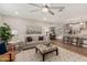 Open living room features a neutral color scheme and seamless flow to the kitchen at 6926 E Moreland St, Scottsdale, AZ 85257