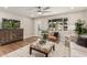 Bright living room boasts a modern ceiling fan and large window with a cozy seating area at 6926 E Moreland St, Scottsdale, AZ 85257