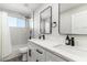 Stylish bathroom with double sinks, modern fixtures, shower and bright natural light at 7014 E Latham St, Scottsdale, AZ 85257