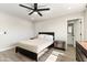 Relaxing bedroom with ceiling fan, natural light, and serene atmosphere at 7014 E Latham St, Scottsdale, AZ 85257