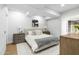 Serene bedroom with a plush bed, neutral tones, and ample natural light streaming through the large windows at 7137 E Rancho Vista Dr # 5001, Scottsdale, AZ 85251