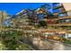 Luxury building featuring multiple terraces, a water feature, palm trees and multiple plantings at 7137 E Rancho Vista Dr # 5001, Scottsdale, AZ 85251