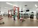 Bright gym featuring squat racks, weight benches, treadmills, and elliptical machines at 7137 E Rancho Vista Dr # 5001, Scottsdale, AZ 85251