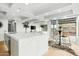 Modern open kitchen with large island, an abundance of natural light, seating and an open floorplan at 7137 E Rancho Vista Dr # 5001, Scottsdale, AZ 85251