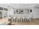 Modern kitchen featuring a large island, stainless steel appliances, seating and an abundance of natural light at 7137 E Rancho Vista Dr # 5001, Scottsdale, AZ 85251
