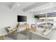 Bright open living room featuring modern decor, comfortable seating, and an abundance of natural light at 7137 E Rancho Vista Dr # 5001, Scottsdale, AZ 85251