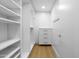 Spacious walk-in closet featuring custom shelving and drawers, providing ample storage for clothing and accessories at 7137 E Rancho Vista Dr # 5001, Scottsdale, AZ 85251
