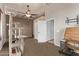 Spare bedroom provides space to stretch out with cat tower, desk, closet, and fan at 7223 W Saddlehorn Rd, Peoria, AZ 85383