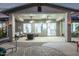 Covered patio with ceiling fans offering outdoor living space and seamless indoor-outdoor flow at 7223 W Saddlehorn Rd, Peoria, AZ 85383