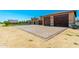 Large three-car garage with ample parking on a paver driveway at 7738 N 185Th Ave, Waddell, AZ 85355