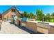 A view of a custom outdoor kitchen at 7738 N 185Th Ave, Waddell, AZ 85355