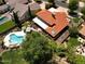 Aerial view of home showing its lush landscaping, pool, and backyard patio at 8373 S Forest Ave, Tempe, AZ 85284
