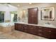 Bright bathroom showcasing a soaking tub, double vanity with modern lighting at 8373 S Forest Ave, Tempe, AZ 85284