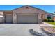 Attractive home with a three-car garage, well-maintained landscaping and beautiful curb appeal at 866 W Hereford Dr, San Tan Valley, AZ 85143