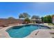 Sparkling pool surrounded by mature landscaping, backyard pergola and beautiful hardscape at 866 W Hereford Dr, San Tan Valley, AZ 85143