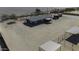 Overhead shot of a property featuring an expansive plot of land and multiple coverings at 9066 N Thunderbird Rd, Maricopa, AZ 85139