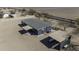 Sprawling property with house and horse stall coverings in rural setting at 9066 N Thunderbird Rd, Maricopa, AZ 85139