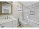 A stylish bathroom with marble tiling, new fixtures, and vanity at 9066 N Thunderbird Rd, Maricopa, AZ 85139