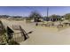 Entry into a horse property showing stalls and an outbuilding at 9066 N Thunderbird Rd, Maricopa, AZ 85139