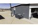 Exterior shot of a property with an AC unit and a utility pole in the background at 9066 N Thunderbird Rd, Maricopa, AZ 85139