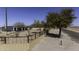 Property exterior shows covered stalls and a desert backdrop at 9066 N Thunderbird Rd, Maricopa, AZ 85139