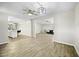 Spacious open-concept living area with views into the kitchen and another living space at 9066 N Thunderbird Rd, Maricopa, AZ 85139