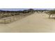 View of the fenced lot from above with a desert landscape at 9066 N Thunderbird Rd, Maricopa, AZ 85139