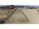 Fenced lot on a sunny day, ready for your use and enjoyment at 9066 N Thunderbird Rd, Maricopa, AZ 85139