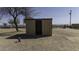 View of outdoor storage shed, a useful area for storing equipment, tools, or machinery at 9066 N Thunderbird Rd, Maricopa, AZ 85139