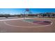 Community basketball court on a sunny day with a well-maintained surface and clear markings for recreational play at 9646 E Tahoe Cir, Mesa, AZ 85212