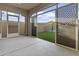 This is a covered patio with a view of the artificial turf backyard, providing a comfortable outdoor space at 9646 E Tahoe Cir, Mesa, AZ 85212