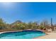 Inviting pool area with mountain views, desert landscaping and clear blue water at 11743 E Desert Vista Dr, Scottsdale, AZ 85255