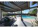 Inviting backyard pool with pergola-covered patio and lounge chairs at 1217 W Campbell Ave, Phoenix, AZ 85013