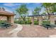 Community patio area featuring picnic tables and BBQ grills for outdoor enjoyment at 1225 N 36Th St # 2091, Phoenix, AZ 85008