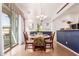 The formal dining room features a decorative chandelier and balcony access at 1225 N 36Th St # 2091, Phoenix, AZ 85008
