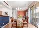Dining room with a chandelier and sliding glass doors to the outside at 1225 N 36Th St # 2091, Phoenix, AZ 85008
