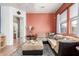 Bright living area with comfortable seating, a ceiling fan, and neutral decor at 1225 N 36Th St # 2091, Phoenix, AZ 85008