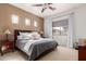 Primary bedroom with a ceiling fan and natural light at 1225 N 36Th St # 2091, Phoenix, AZ 85008