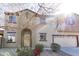 Charming two-story home with landscaped yard, archway entrance, and a two car garage at 1349 E Dunbar Dr, Phoenix, AZ 85042