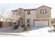Charming two-story home with landscaped front yard, archway entrance, and a two car garage at 1349 E Dunbar Dr, Phoenix, AZ 85042